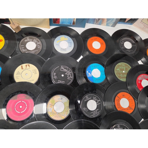 678 - A Collection of 45 RPM Vinyl Singles