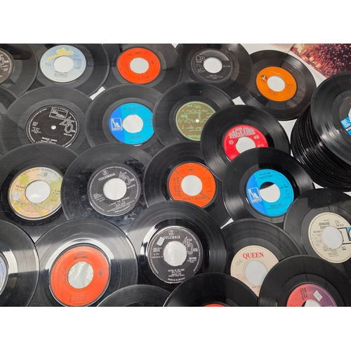 678 - A Collection of 45 RPM Vinyl Singles