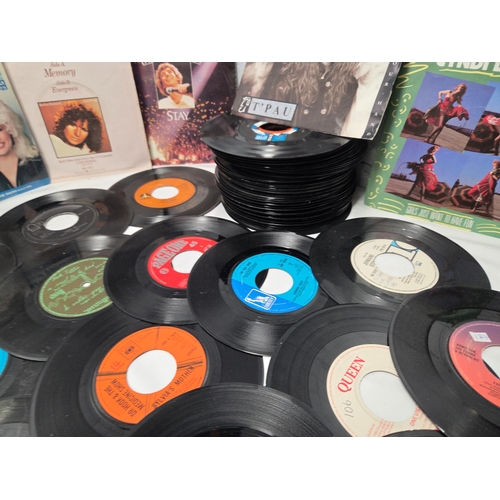 678 - A Collection of 45 RPM Vinyl Singles