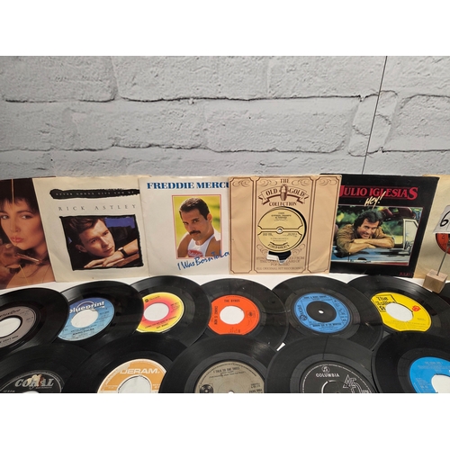 678 - A Collection of 45 RPM Vinyl Singles