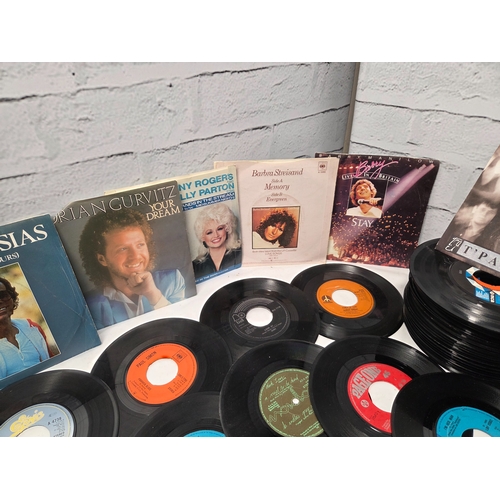 678 - A Collection of 45 RPM Vinyl Singles