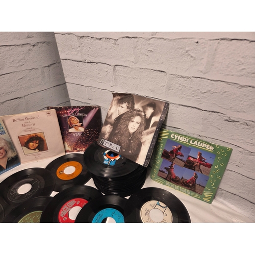 678 - A Collection of 45 RPM Vinyl Singles