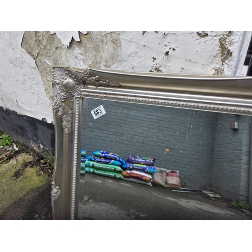 683 - A Silver Painted Ornate Mirror (approx 106cm x 76cm)