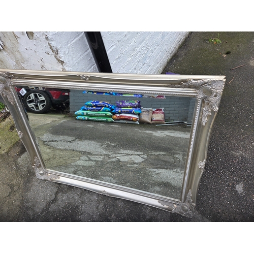 683 - A Silver Painted Ornate Mirror (approx 106cm x 76cm)