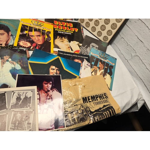 687 - A Collection of Elvis Presley Memorabilia to include Vinyl, Magazines and more