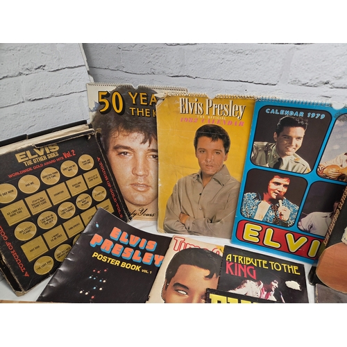 687 - A Collection of Elvis Presley Memorabilia to include Vinyl, Magazines and more