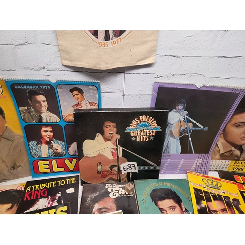 687 - A Collection of Elvis Presley Memorabilia to include Vinyl, Magazines and more