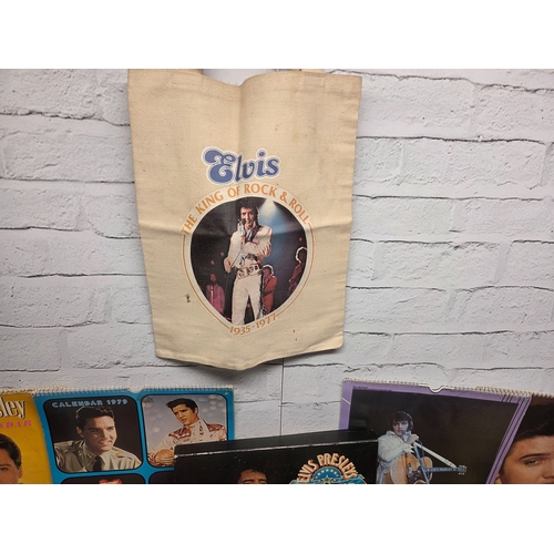 687 - A Collection of Elvis Presley Memorabilia to include Vinyl, Magazines and more