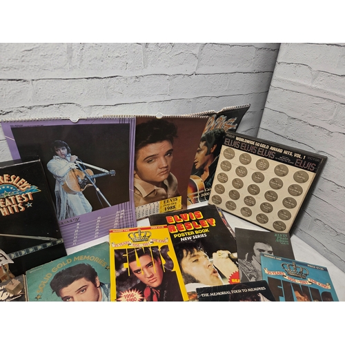 687 - A Collection of Elvis Presley Memorabilia to include Vinyl, Magazines and more