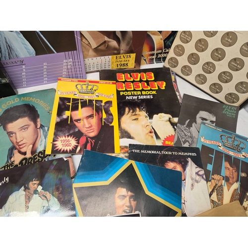 687 - A Collection of Elvis Presley Memorabilia to include Vinyl, Magazines and more