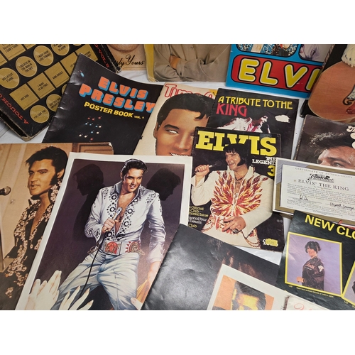 687 - A Collection of Elvis Presley Memorabilia to include Vinyl, Magazines and more