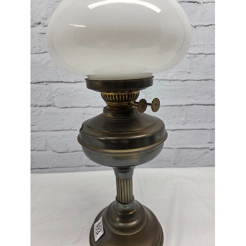 693 - A Brass Oil Lamp complete with Shade and Chimney