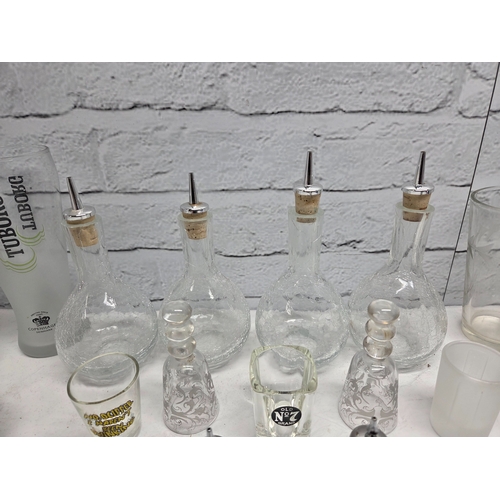 739 - A Mixed Lot of Glassware to include Branded Beer Glasses, Cocktail Making Equipment etc
