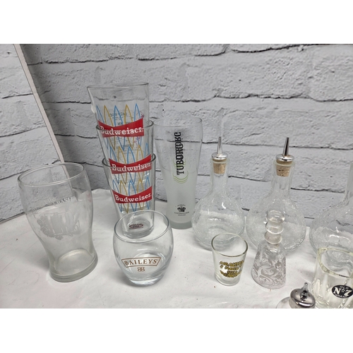 739 - A Mixed Lot of Glassware to include Branded Beer Glasses, Cocktail Making Equipment etc