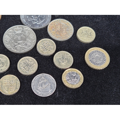 34 - A mixed lot of assorted UK Coins to include a £2 coins, £1 coins etc