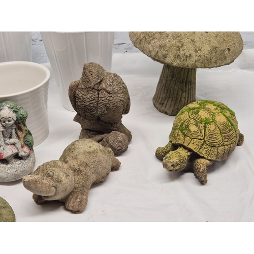 665A - A Collection of weathered Garden Ornaments together with six Flowerpots