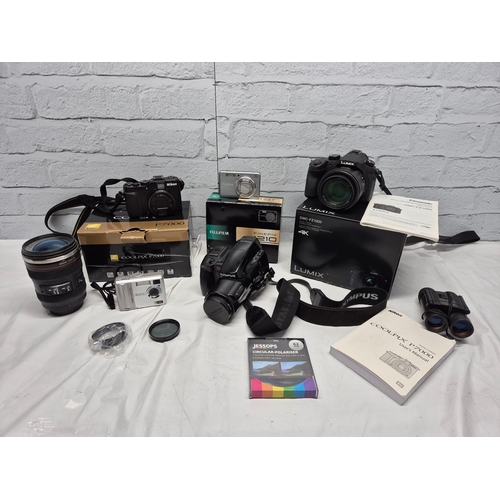 675C - A Collection of Modern Cameras/Equipment to include Panasonic Lumix DMC-FZ1000, Nikon Coolpix P7000,... 