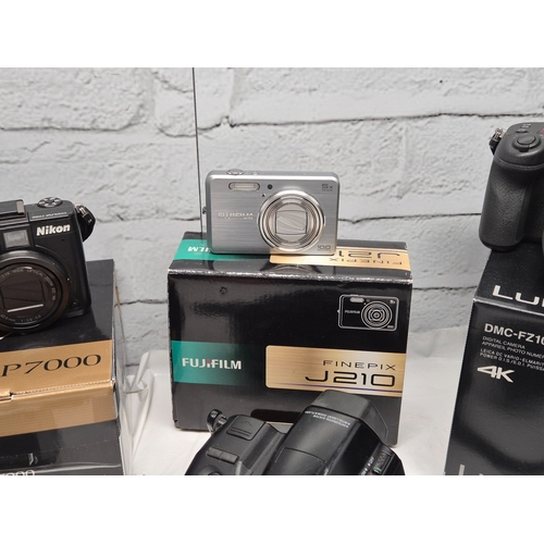 675C - A Collection of Modern Cameras/Equipment to include Panasonic Lumix DMC-FZ1000, Nikon Coolpix P7000,... 
