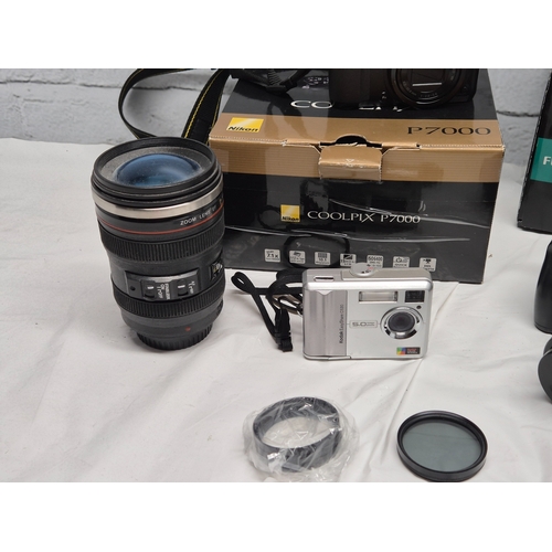 675C - A Collection of Modern Cameras/Equipment to include Panasonic Lumix DMC-FZ1000, Nikon Coolpix P7000,... 