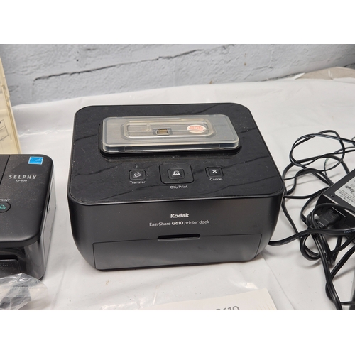 675D - Two Photo Printers - a Kodak EasyShare G610 and a Canon Selphy CP800 together with some Ink/Photo Pa... 
