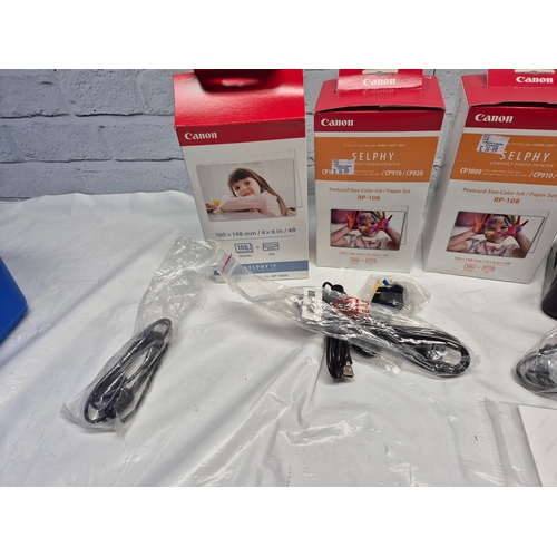 675D - Two Photo Printers - a Kodak EasyShare G610 and a Canon Selphy CP800 together with some Ink/Photo Pa... 