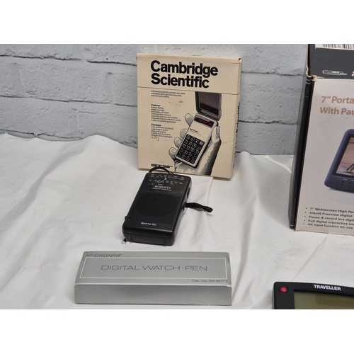 678C - A Collection of Classic Electronics to include to include Nokia Phones, Motorolla Flip Phone, Sealed... 