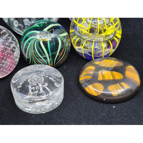 A Collection of Glass Paperweights to include Caithness
