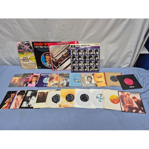 A Collection of Vinyl Records and 45 RPM Singles to include The Beatles ...