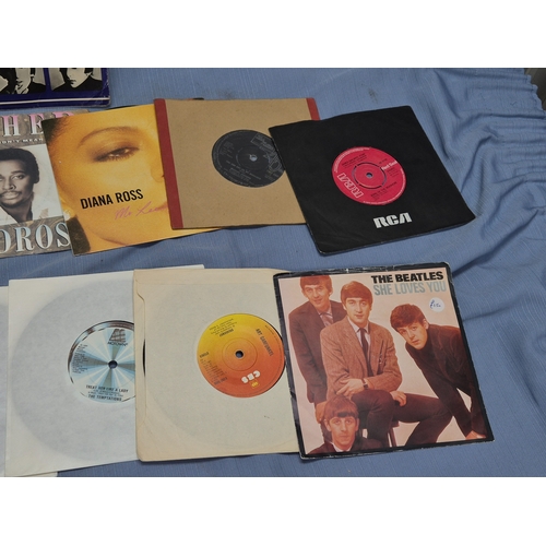 A Collection of Vinyl Records and 45 RPM Singles to include The Beatles ...