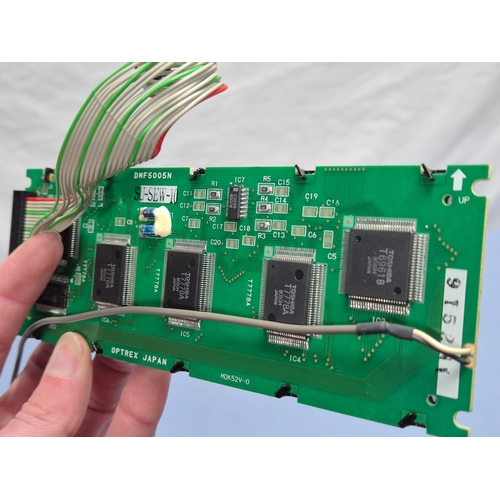 LCD display panel with ribbon cable and connector.