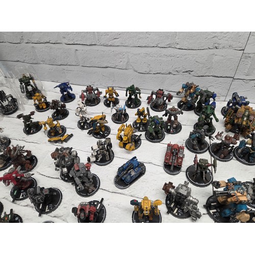 A Very Large Collection of Wizkid Mechwarrior Miniature Figurines