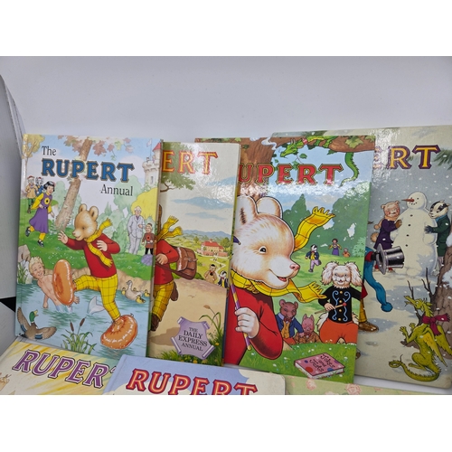 A Collection of 8 Vintage Rupert the Bear Annuals