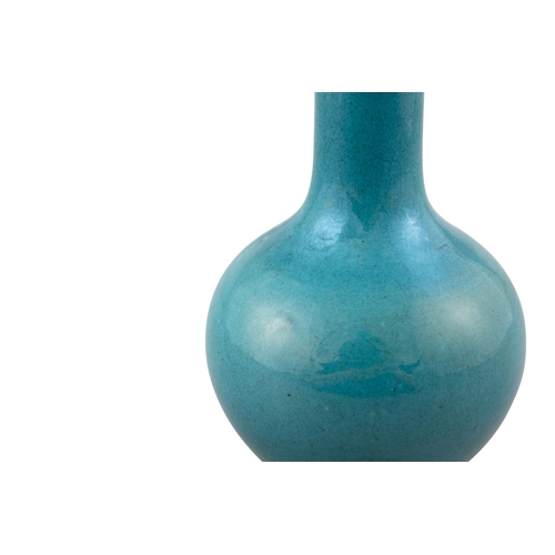 129 - *A SMALL PEACOCK BLUE GLAZED PORCELAIN BOTTLE VASE  20?? ??????  China, 20th century  H: 17.3 cm  IM... 