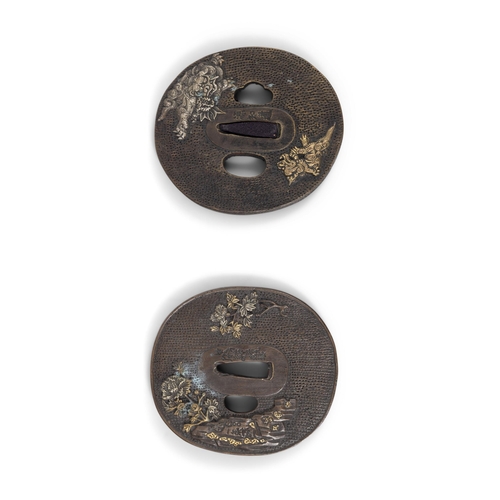 137 - TWO OVAL-FORM, MIXED METAL-INLAID TSUBAS WITH FLOWER AND SHISHI DESIGN, SIGNED  Japan, Meiji period ... 