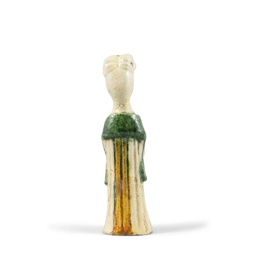 21 - A SANCAI-GLAZED POTTERY FIGURE OF A STANDING LADY  ?? ??????  China, Tang dynasty  H: 14.4cm
