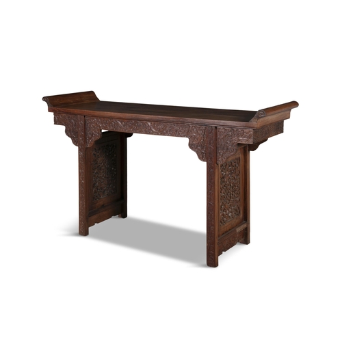 42 - A CHINESE CARVED HARDWOOD ALTAR TABLE  ?? 20?? ???????  China, 20th century  with raised scroll ends... 