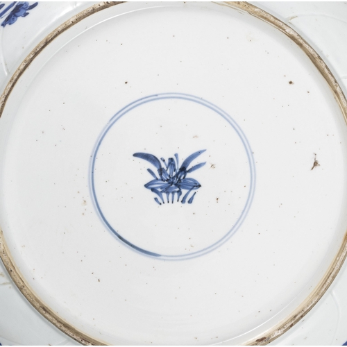 77 - TWO BLUE AND WHITE CHARGERS, ONE FLOWER-SHAPED DECORATED WITH FLOWERS AND LANDSCAPE, MARKED WITH A F... 