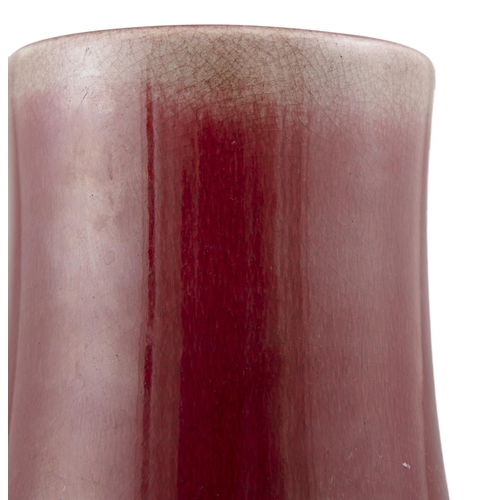 96 - *A FLAMBE / OXBLOOD GLAZED PORCELAIN BALUSTER VASE  ?? ?????  Qing dynasty It rests on a spread foot... 