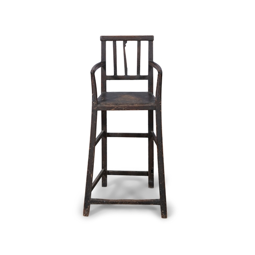 101 - A 19TH CENTURY PAINTED PINE CHILDS HIGH CHAIR  with stick back and bowed armrest on canted square su... 