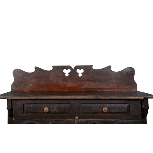 147 - A 19TH STAINED PINE CUPBOARD,  the carved and pierced gallery back on a shaped rectangular top, the ... 