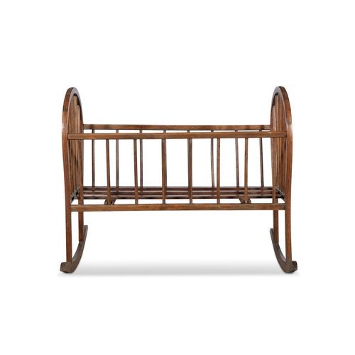 148 - A VICTORIAN PINE CHILD'S COT,    with rocker base, 75cm high, 90cm long, 49cm wide.