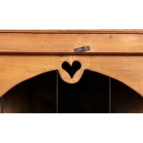 161 - A 19TH CENTURY STRIPPED PINE CUPBOARD WITH ARCHITECTURAL PEDIMENT,  above twin fielded panel doors e... 