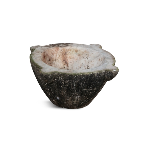 193 - A LARGE WHITE MARBLE CIRCULAR MORTAR,   the tapering bowl with four exterior lug hands and flattened... 