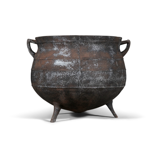 194 - A EARLY 19TH CENTURY LARGE CAST IRON POT,  of circular bulbous form, with out-turned rim, and applie... 