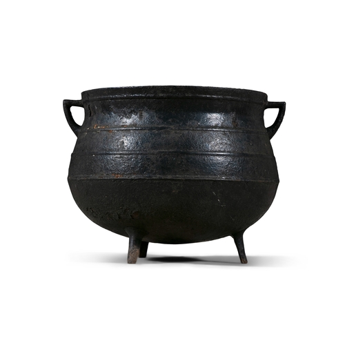 195 - A EARLY 19TH CENTURY LARGE CAST IRON POT,  of circular bulbous form, with out-turned rim, and applie... 