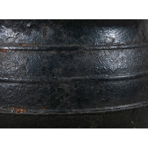 195 - A EARLY 19TH CENTURY LARGE CAST IRON POT,  of circular bulbous form, with out-turned rim, and applie... 