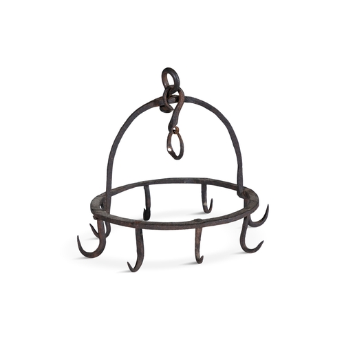 198 - A CAST IRON 'DUTCH CROWN' GAME-HANGER,  the circular frame with applied hooks. 26cm diameter, 27cm h... 