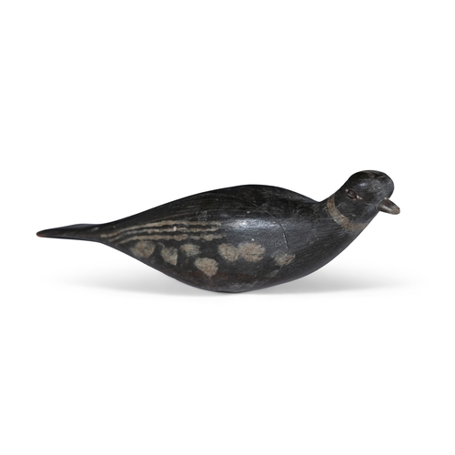 210 - A PAINTED CARVED TIMBER DECOY MODEL OF A PIDGEON  with a hinged support beneath. 30cm long, 9cm wide... 