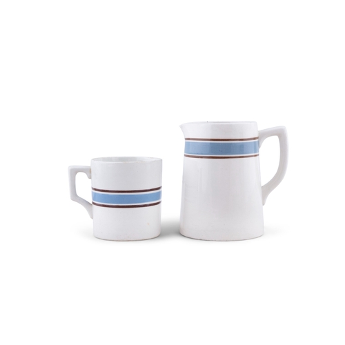 215 - TWO CARRIGALINE WHITE GLAZED EARTHENWARE JUGS  blue within brown. 14cm; together with three earthenw... 