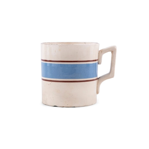 216 - FIVE CARRIGALINE POTTERY MUGS WITH BLUE BAND.   the largest 9cm